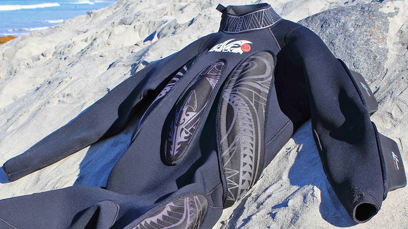 Illustration for article titled The Foam Fins Covering This Wetsuit Let You Body Surf Without a Board